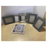 GROUP OF SIX PICTURE FRAMES IN VARIOUS FINISHES