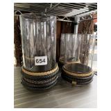 SET OF FOUR LEATHER WRAPPED CANDLE HOLDERS