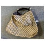 GUCCI PURSE MADE IN ITALY DOES HAVE STAIN ON BASE