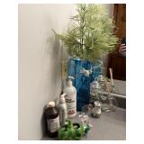 BLUE GLASS VASE, SANITIZER, ETC.