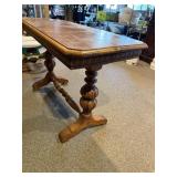 LIBRARY TABLE WHICH OPENS UP FOR A LEAF, CARVED