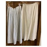 TWO LINEN SKIRTS SOME LIGHT STAINS ON ONE, THE