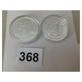 TWO SILVER COINS EACH 1/2 OUNCE