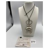 NAVAJO SAND CAST PENDANT 4 INCHES LONG