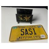 MAIL HOLDER AND LICENSE PLATE