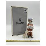 LLADRO CHRISTMAS BOY WITH DOG FIGURINE