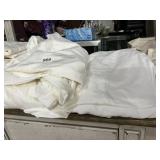 COLLECTION OF WHITE LINENS AND TEXTILES.