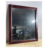 RECTANGULAR WALL MIRROR IN DARK WOOD FRAME.