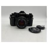 CANON A-1 35MM SLR CAMERA WITH LENS AND