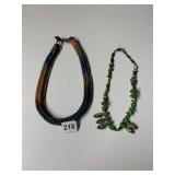 MULTI-COLORED BRAIDED NECKLACE AND GREEN BEADED