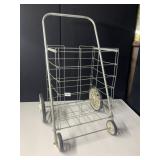 WIRE SHOPPING CART - FOLDING DESIGN, FOUR WHEELS.