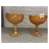 PAIR OF AMBER CARNIVAL GLASS COMPOTES - EMBOSSED