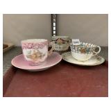 THREE PORCELAIN TEACUPS AND SAUCERS - PINK