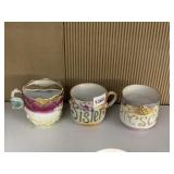 THREE PORCELAIN MUSTACHE CUPS - 'SISTER'