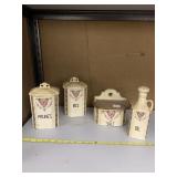 KITCHEN CANISTER SET - FOUR CERAMIC PIECES,