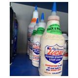 FULL BOTTLES OF LUCAS STOP LEAK AND OIL