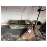 BELIEVED TO BE A TRANSMISSION JACK HOLDER SEE