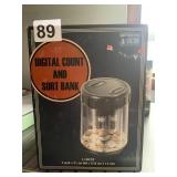 DIGITAL COUNT AND SORT BANK, COIN SORTER.