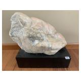 ART MARBLE ABSTRACT SCULPTURE ON BLACK BASE.
