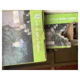 SOLAR LIGHTS NEVER USED ONE BOX IN POOR CONDITION