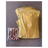 APPROX 5 YELLOW DRAPES W/ BRASS HANGERS.