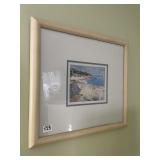 FRAMED COASTAL SCENE PRINT W/ LIGHT WOOD FRAME.