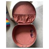 HAT BOX AND SUNGLASSES.