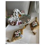 CERAMIC FLORAL CENTERPIECE, DECORATIVE PILLOWS.