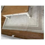 AREA RUG - BEIGE W/ BORDER DESIGN.