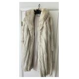 SAGA FOX NATURAL BLUE FOX FUR COAT W/ STAINED