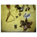 ASSORTED VINTAGE BUTTONS AND LAPEL PINS WITH CUFF