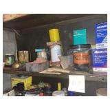ASSORTED OIL FILTERS, FLUID CANS & AUTO SUPPLIES.