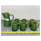MINIATURE GREEN GLAZED CERAMIC PITCHER AND SHOT