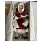 THE PRESTIGE COLLECTION 20IN CHRISTMAS DOLL.