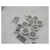 LED PUCK LIGHTS W/ REMOTES.