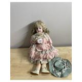 VINTAGE GERMAN PORCELAIN DOLL W/ HAT.