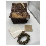 WOVEN BASKET, CERAMIC TILES, JINGLE BELLS.