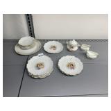 ASSORTED PORCELAIN PLATES, CREAMER, SUGAR BOWL.