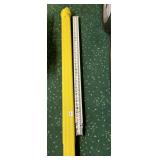 EXTENDABLE SURVEYING LEVELING ROD W/ YELLOW CASE.