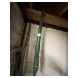 GREEN PAINTED METAL IMPLEMENT POLE W/ CAST