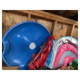 BLUE PLASTIC SAUCER SLED, ROCKS HOCKEY INFLATABLE