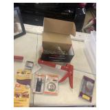 RED CAULK GUN, FASTENMASTER THRULOK THROUGH-BOLT