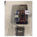 AUTO WORLD NESTLE RACING RIGS SLOT RACERS NO. 1 &