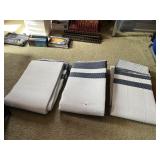 OUTDOOR WOVEN PLASTIC MATS, WHITE W/ BLUE