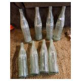 8 ONE PINT GLASS COCA COLA BOTTLES
