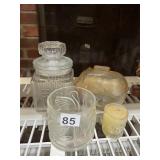 ASSORTED CLEAR AND AMBER GLASS JARS, SWAN DESIGN