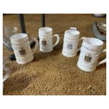 AMERICAN EAGLE CERAMIC BEER STEINS - SET OF 4,
