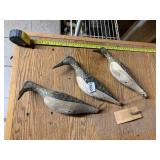 HAND MADE CARVED WOOD BIRDS ON STRINGER, ONE BEAK