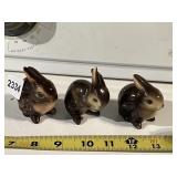 THREE GOEBEL CERAMIC RABBIT FIGURINES - BROWN