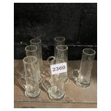 SET OF 7 BLOWN GLASS HANDLED SHOT GLASSES